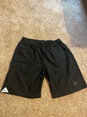Umbro Black Men's Athletic Shorts with Subtle Pattern
